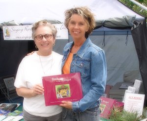 Christine (left)  w/ Singing River Publications
