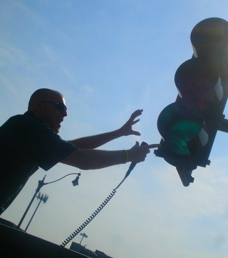 We dared our Double Decker Tour Bus Guide to touch the stop light :)