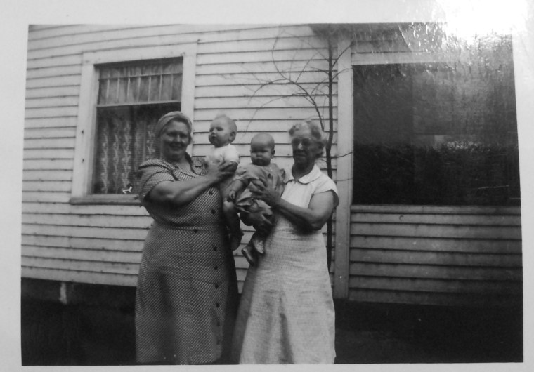 This is my my Great Grandmother (left) holding my Aunnt Jackie and my Great Great Grandmother (right) holding my Uncle Dallas)